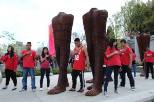 Magdalena Abakanowicz. WALKING FIGURES at Cambie and Broadway in Vancouver. 2014 - 2016 exhibition. students from Charles Tupper school. Photo by LAY TUAN TAN 0517