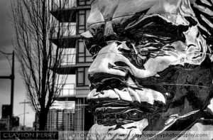 Miss Mao Trying to Poise Herself at the Top of Lenin's Head. Photo by Clayton Perry_01